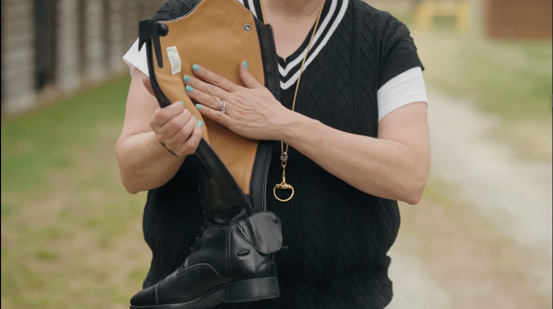 Michelle holding the rear zipper open on Ariat Palisade