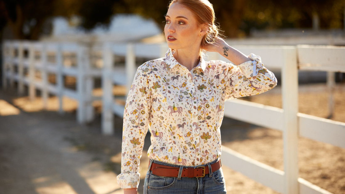 Rider wearing Ariat horse and floral print shirt