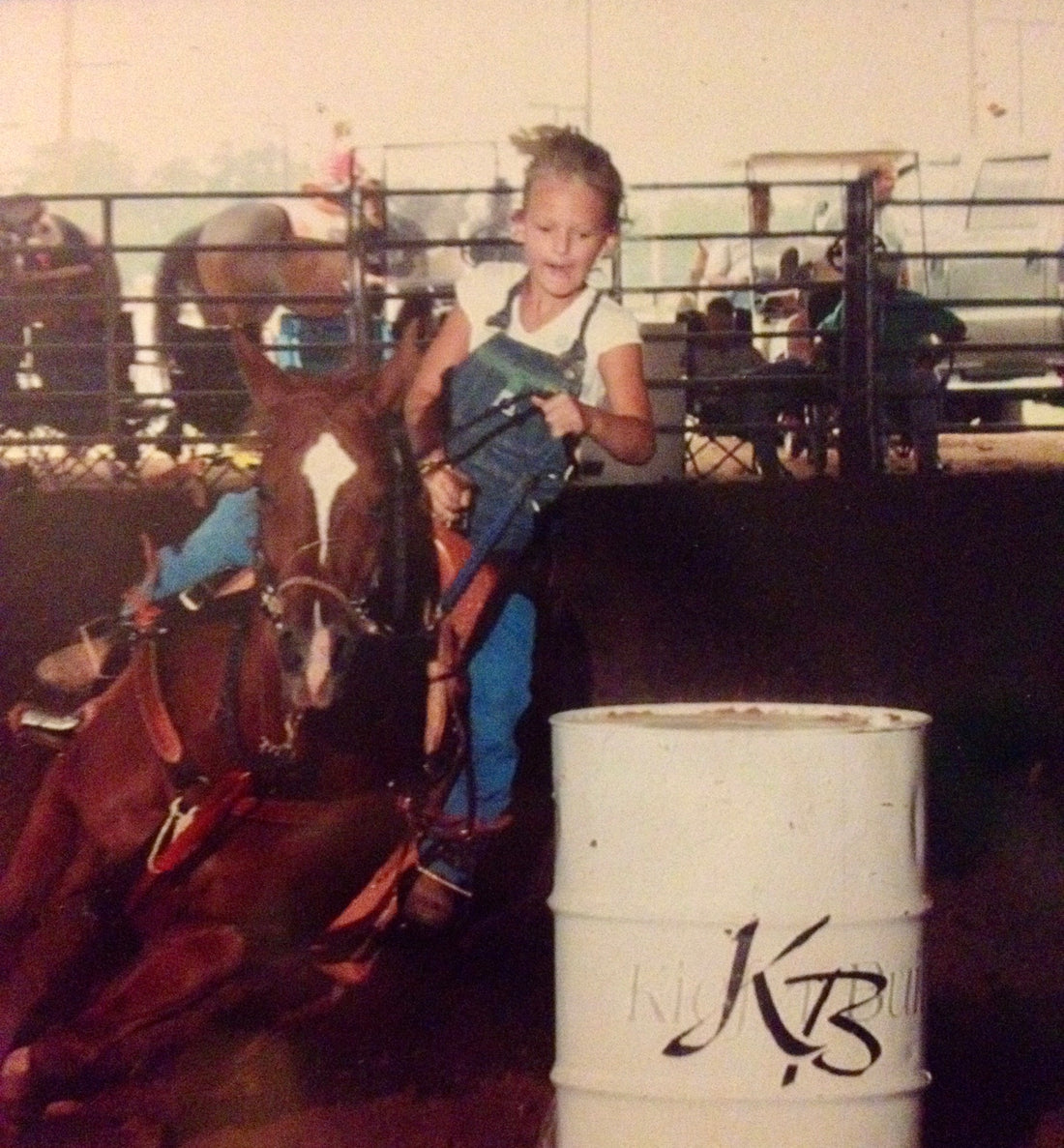 Young girl winning barrel races