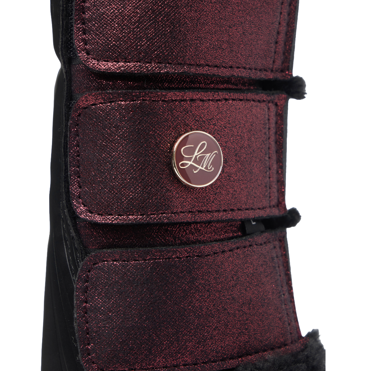 LeMieux Lustre Fleece Edged Brushing Boots close-up view in garnet