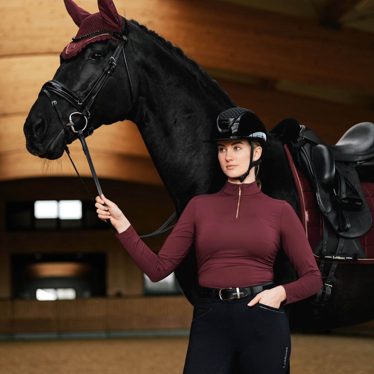 LeMieux Women's Lustre Ruched Long Sleeve Base Layer  Model view in garnet