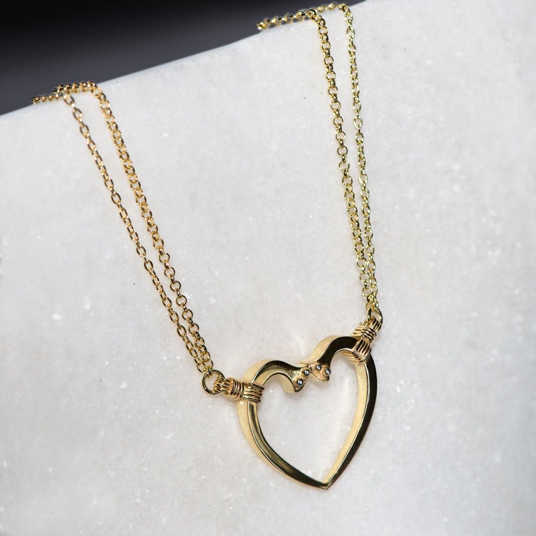 Ava - Equestrian Horseshoe Nail Heart Necklace in Gold