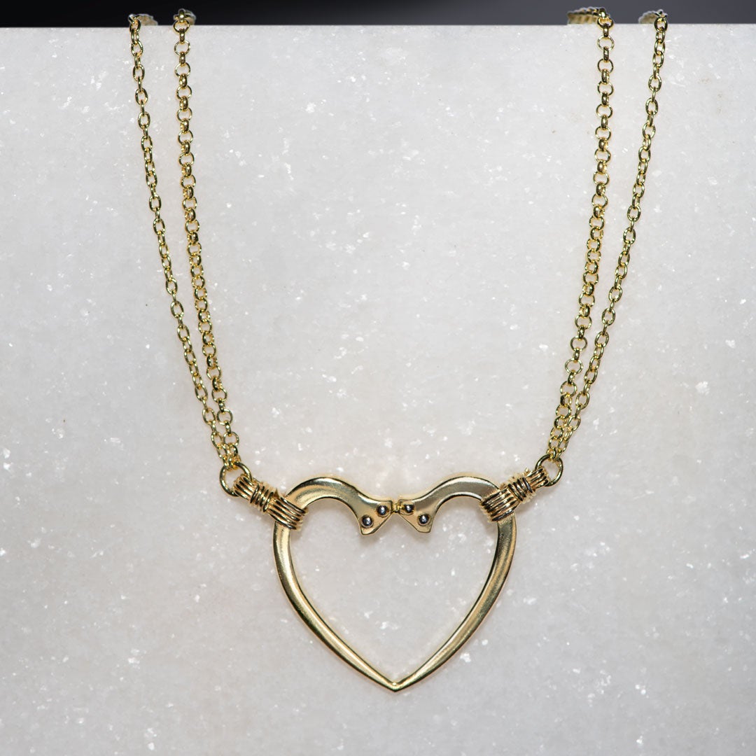 Ava - Equestrian Horseshoe Nail Heart Necklace in Gold