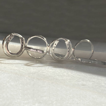 Handcast Horseshoe and Sterling Silver on Brass Center Ring Bun Cover