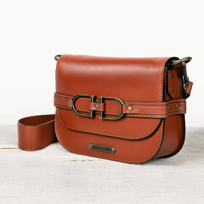 Urban Equestrian  Delaney - Equestrian Stirrup Crossbody Luxury Leather Handbag in Cognac