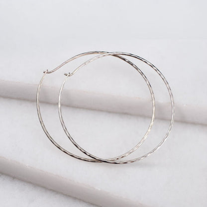 Urban Equestrian  Hammered Hoops - Infinity Clasp Round Shape Sterling Silver Earring