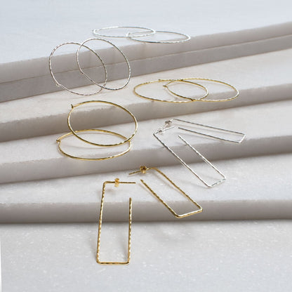 Urban Equestrian  Hammered Hoops - Infinity Clasp Round Shape Sterling Silver Earring