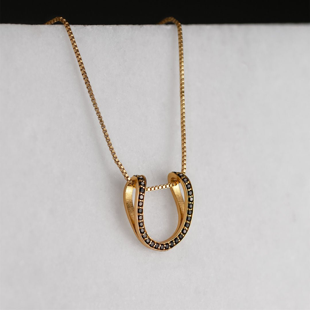 Urban Equestrian  Levade -Black Moissanite Horseshoe Equestrian Necklace in Gold