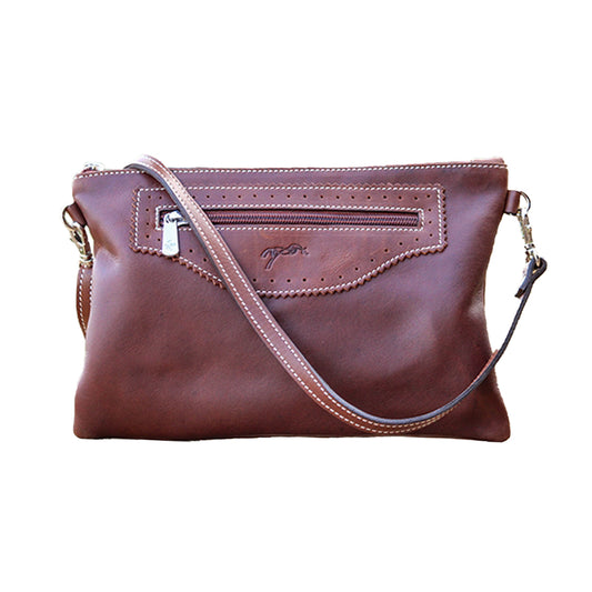 Penelope Emma Handbag: A small, notched handbag with a leather strap and a zippered front pocket, in Havana.